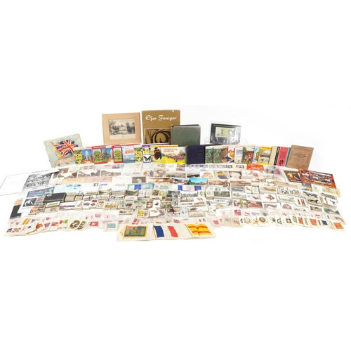 681 - Early 20th century and later ephemera including cigarette cards, some arranged in albums and Ofer Fe... 