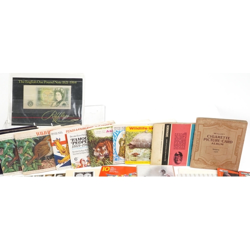 681 - Early 20th century and later ephemera including cigarette cards, some arranged in albums and Ofer Fe... 