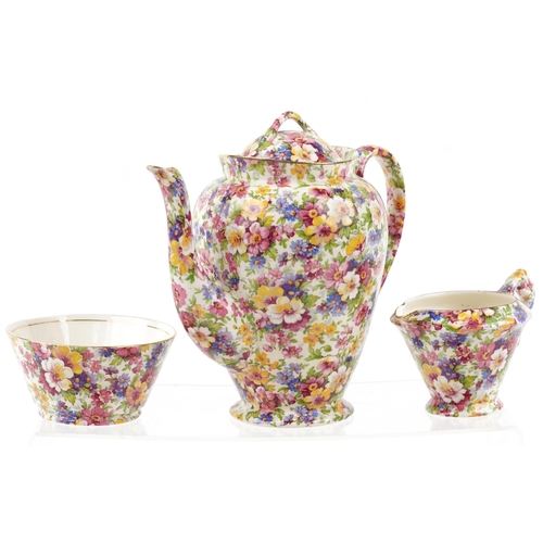 267 - James Kent chintz four place coffee service 'Fenton Du Barry', the coffee pot 20cm high