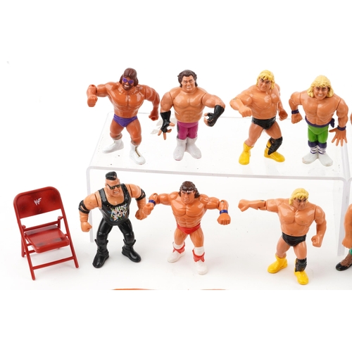 1568 - Vintage World Wrestling action figures and accessories including Hulk Hogan, Hammer and The Undertak... 