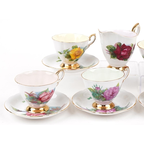 1185 - Paragon six place tea service comprising six cups with saucers, milk jug and sugar bowl decorated wi... 