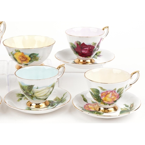 1185 - Paragon six place tea service comprising six cups with saucers, milk jug and sugar bowl decorated wi... 