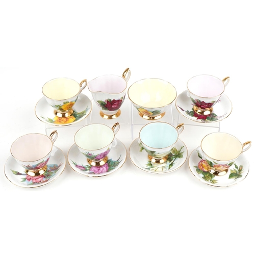 1185 - Paragon six place tea service comprising six cups with saucers, milk jug and sugar bowl decorated wi... 