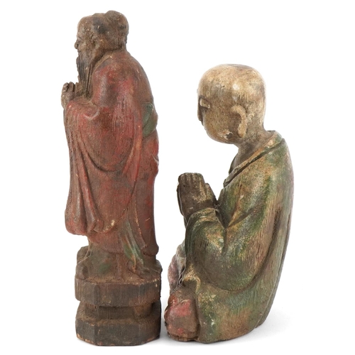 196 - Chinese polychrome painted carved wood seated Buddha and an Elder figure, the  largest 27cm high