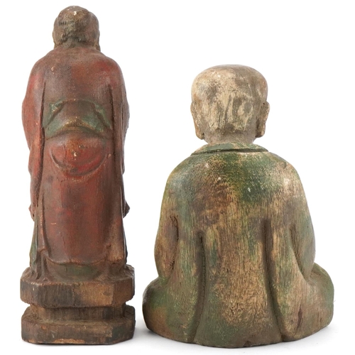 196 - Chinese polychrome painted carved wood seated Buddha and an Elder figure, the  largest 27cm high