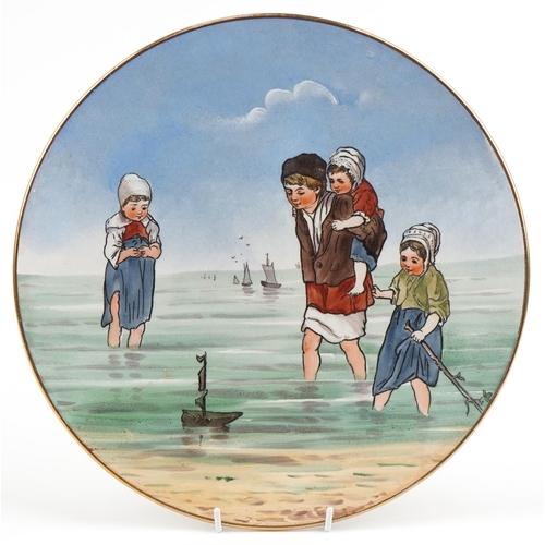 264 - Villeroy & Boch, German porcelain wall charger hand painted with four children paddling at the seasi... 