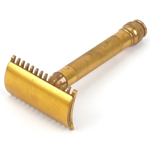 1345 - Early 20th century Gillette gilt metal razor housed in a velvet lined fitted case, the case 10.5cm w... 