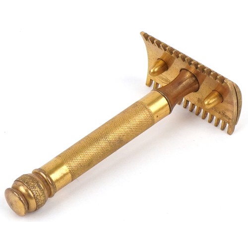 1345 - Early 20th century Gillette gilt metal razor housed in a velvet lined fitted case, the case 10.5cm w... 