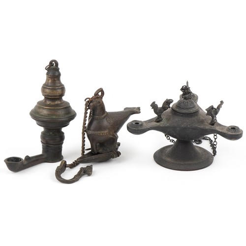 534 - Two antique Indian bronzed hanging oil lamps, one in the form of a mythical bird and a Byzantine sty... 