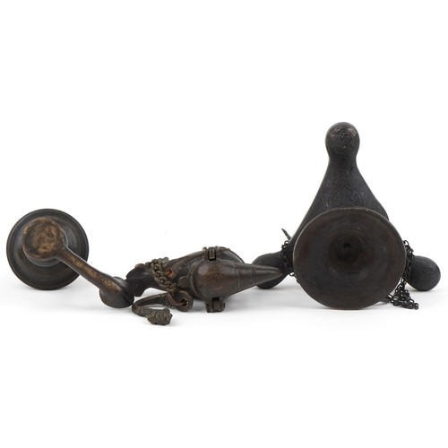 534 - Two antique Indian bronzed hanging oil lamps, one in the form of a mythical bird and a Byzantine sty... 