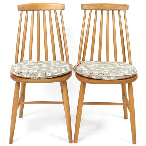 1108 - Ercol style lightwood drop end dining table with two stick back chairs, the table 74cm H x 55cm W x ... 