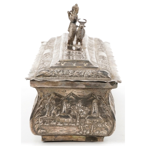 376 - Anglo Indian unmarked silver presentation box, the casket profusely embossed with a continuous town ... 