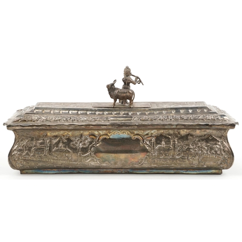 376 - Anglo Indian unmarked silver presentation box, the casket profusely embossed with a continuous town ... 