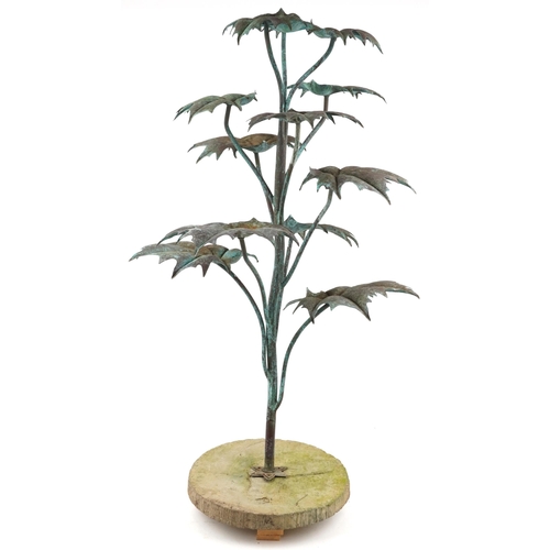 244 - Gary Pickles 2000, verdigris copper garden fountain raised on a naturalistic circular stone base, 10... 