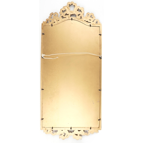 1134 - Ornate gilt framed pier mirror with bow crest, 88cm x 38.5cm