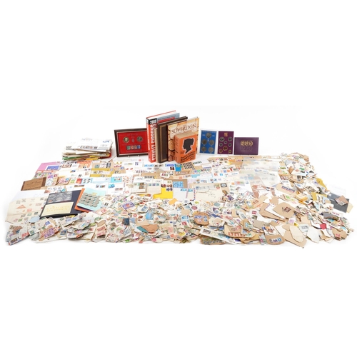 669 - Collection of world stamps and various reference books including The Sovereign, Introduction by Dani... 