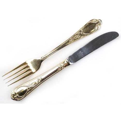 1190 - German SBS canteen of gold plated cutlery housed in a brown leather brief case, 45.5cm wide