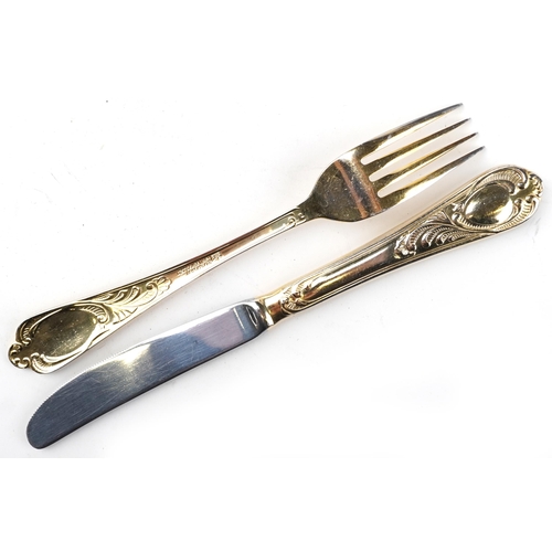 1190 - German SBS canteen of gold plated cutlery housed in a brown leather brief case, 45.5cm wide