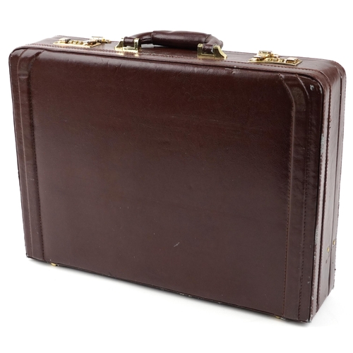 1190 - German SBS canteen of gold plated cutlery housed in a brown leather brief case, 45.5cm wide