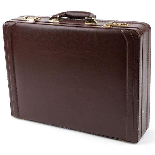 1190 - German SBS canteen of gold plated cutlery housed in a brown leather brief case, 45.5cm wide