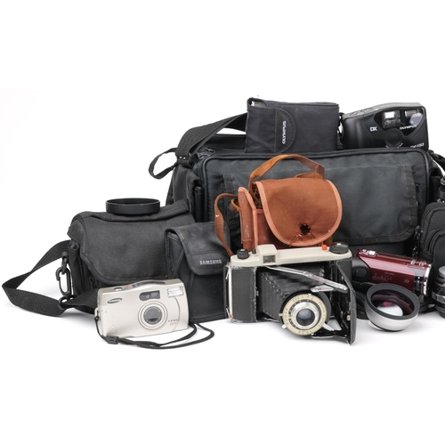 758 - Vintage and later cameras, lenses and accessories including Zenit-B, Canon EOS300V, Olympus, Tonica ... 