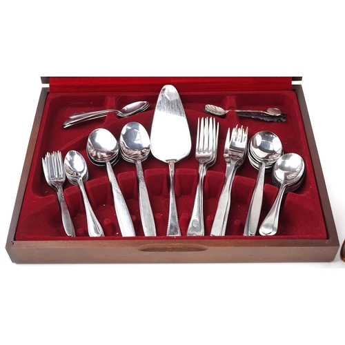 1194A - Mid century stainless steel cutlery arranged in two canteens including Viners Studio and Viners Spla... 