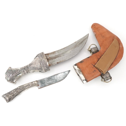 382 - Omani unmarked silver jambiya dagger with steel blade and silver handled knife, 26cm in length