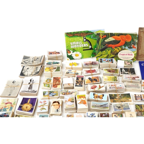 679 - Extensive collection of early 20th century and later cigarette cards, some arranged in albums includ... 