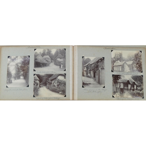 750 - Early 20th century black and white photographs relating to the Isle of Man arranged in an album incl... 