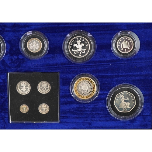 644 - Elizabeth II 2000 United Kingdom Millennium silver coin collection by The Royal Mint housed in a fit... 