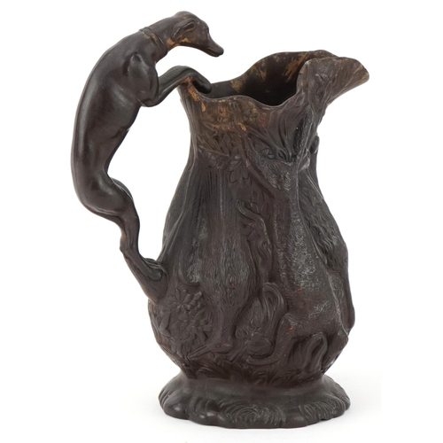 1306 - Victorian Wilhelm Schiller & Sons pottery hunting jug with greyhound design handle, 19cm high