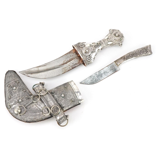 382 - Omani unmarked silver jambiya dagger with steel blade and silver handled knife, 26cm in length