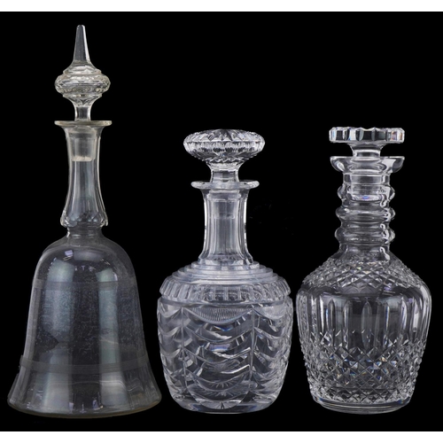 1475 - Three cut glass decanters including one with swags, the largest 33.5cm high