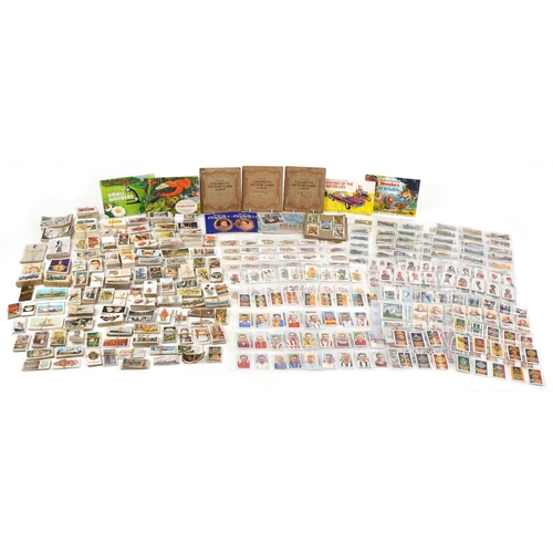 679 - Extensive collection of early 20th century and later cigarette cards, some arranged in albums includ... 