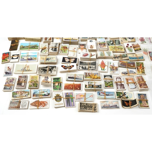 679 - Extensive collection of early 20th century and later cigarette cards, some arranged in albums includ... 