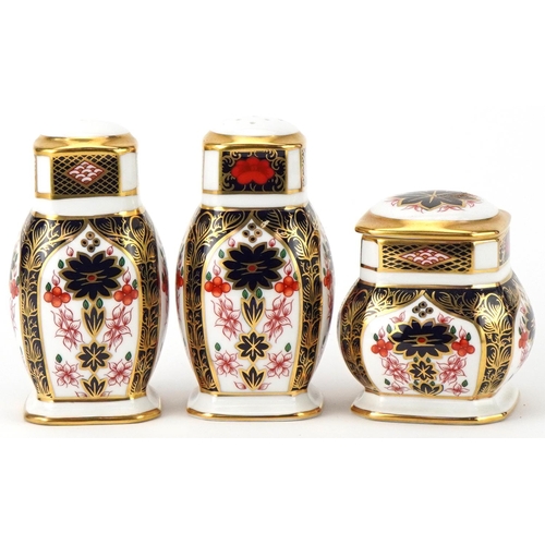 81 - Royal Crown Derby Old Imari three piece cruet set , the largest 9.5cm high