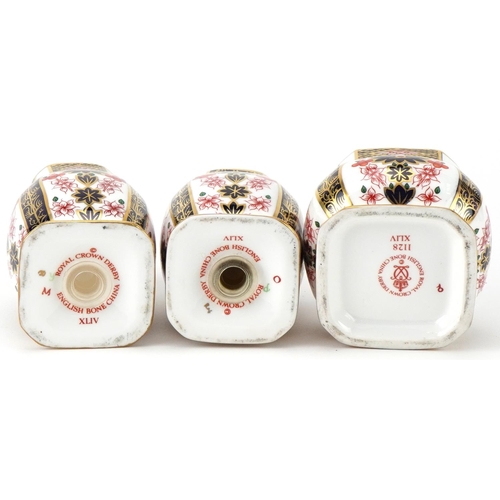 81 - Royal Crown Derby Old Imari three piece cruet set , the largest 9.5cm high