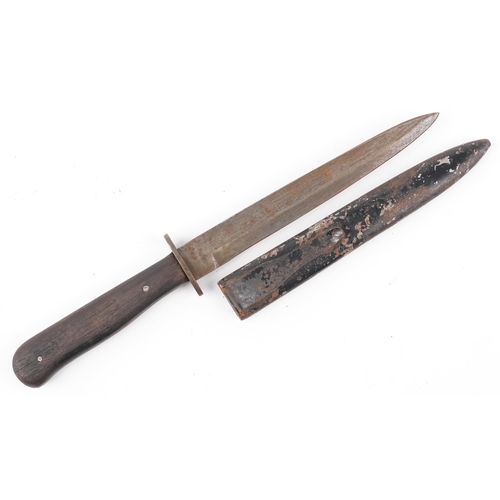 1828 - German military interest boot knife with sheath and steel blade having impressed mark, 29cm in lengt... 