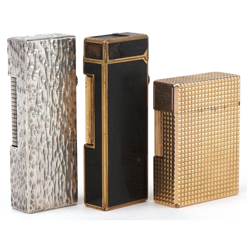 39 - Three vintage pocket lighters, gold plated S J Dupont, silver plated Dunhill bark design and gold pl... 
