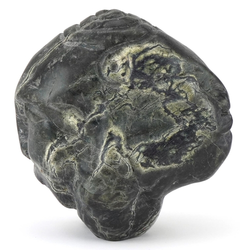 541 - Large natural history and geology interest serpentine specimen carved with three faces, 20cm high