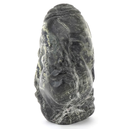 541 - Large natural history and geology interest serpentine specimen carved with three faces, 20cm high