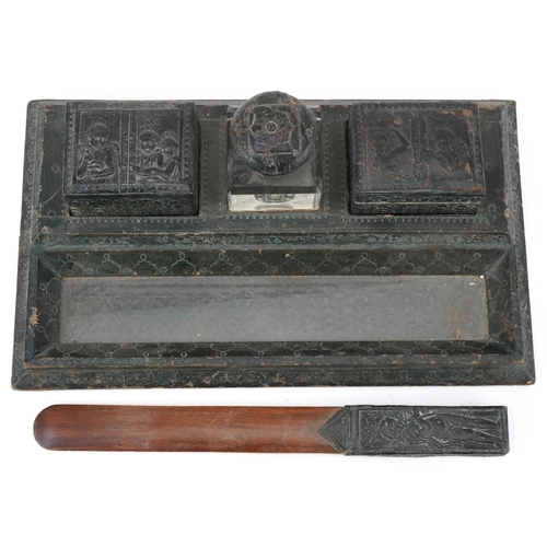 477 - 19th century European leather desk stand with two boxes, inkwell and letter opener embossed with fig... 