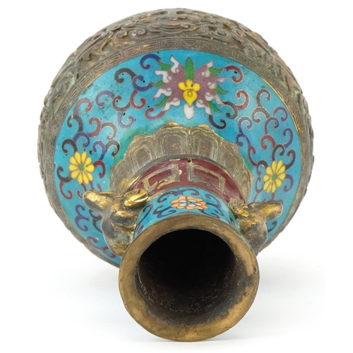 183 - Chinese patinated bronze and cloisonne vase with elephant head handles enamelled with bands of flowe... 