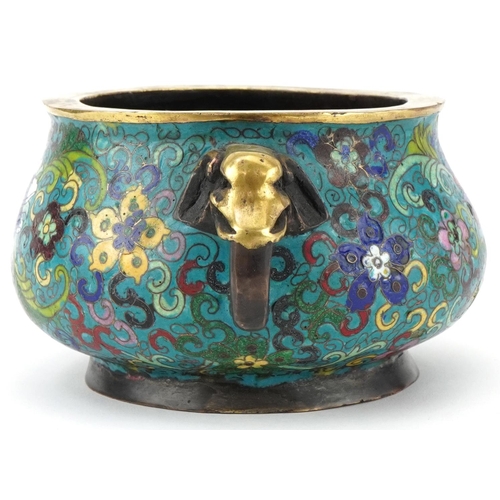 181 - Chinese patinated bronze and cloisonne censer with elephant head handles enamelled with flowers amon... 