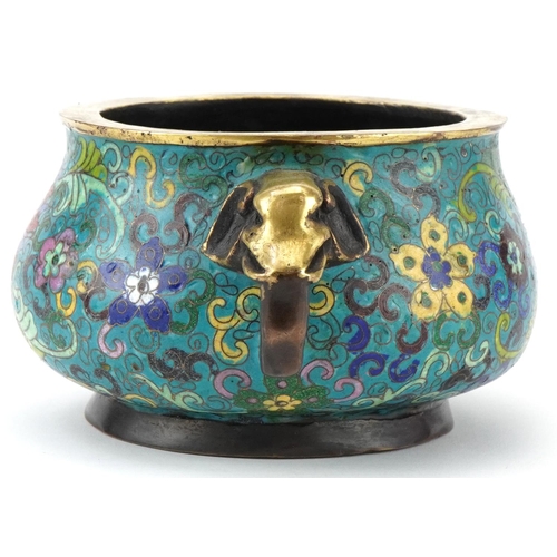 181 - Chinese patinated bronze and cloisonne censer with elephant head handles enamelled with flowers amon... 