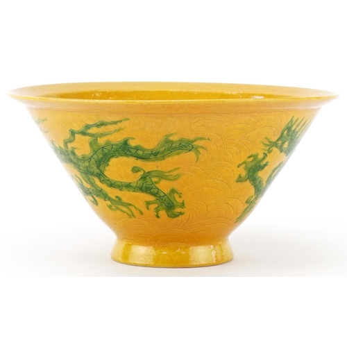 216 - Chinese hand painted yellow glazed dragon bowl, character marks to the base, 8cm high