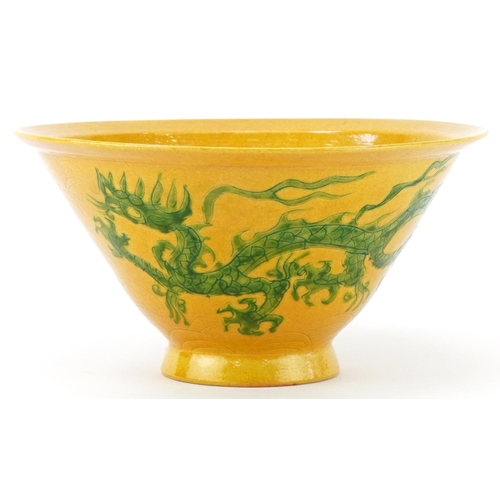 216 - Chinese hand painted yellow glazed dragon bowl, character marks to the base, 8cm high