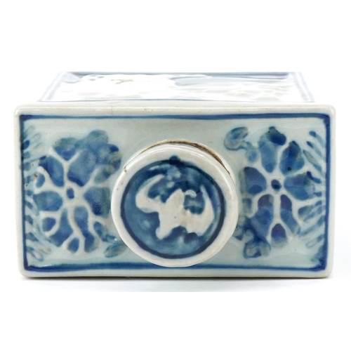 213 - Chinese porcelain tea caddy hand painted with flowers, embossed with figures, 15cm high