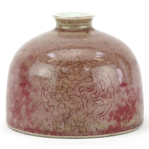 214 - Chinese porcelain inkwell incised with rosettes, blue character mark to the base, 10cm high