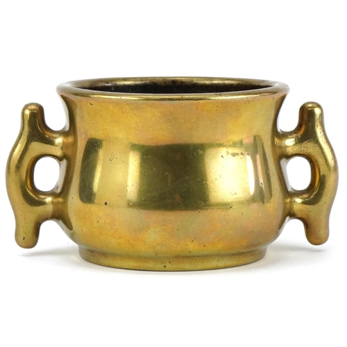 184 - 18th century Chinese gilt bronze incense burner, character mark to the base, 1029.0g, 8.5cm high